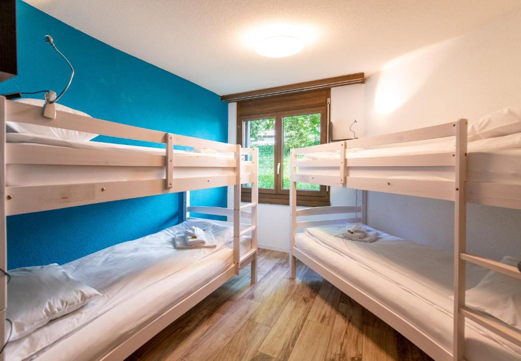 Postel nebo postele na pokoji v ubytování Chalet Petunia