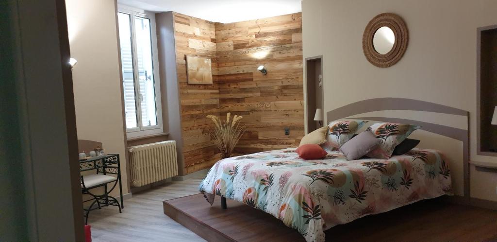 Postel nebo postele na pokoji v ubytování L'AUGLANAS