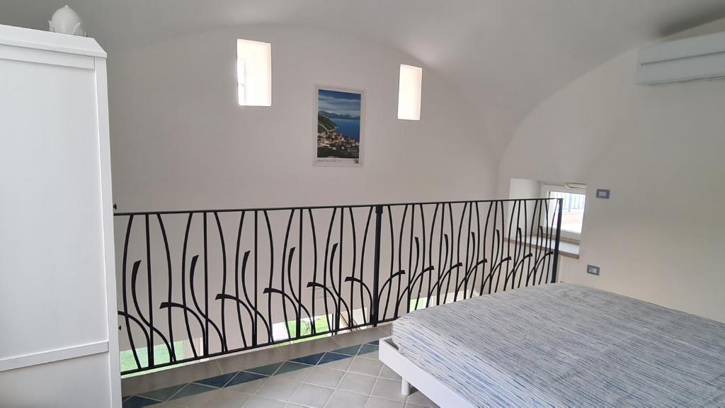 Letto o letti in una camera di The little tower of Minuta