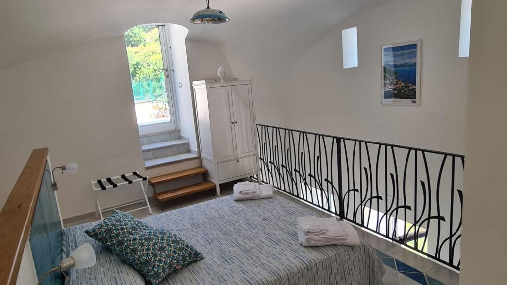 Letto o letti in una camera di The little tower of Minuta