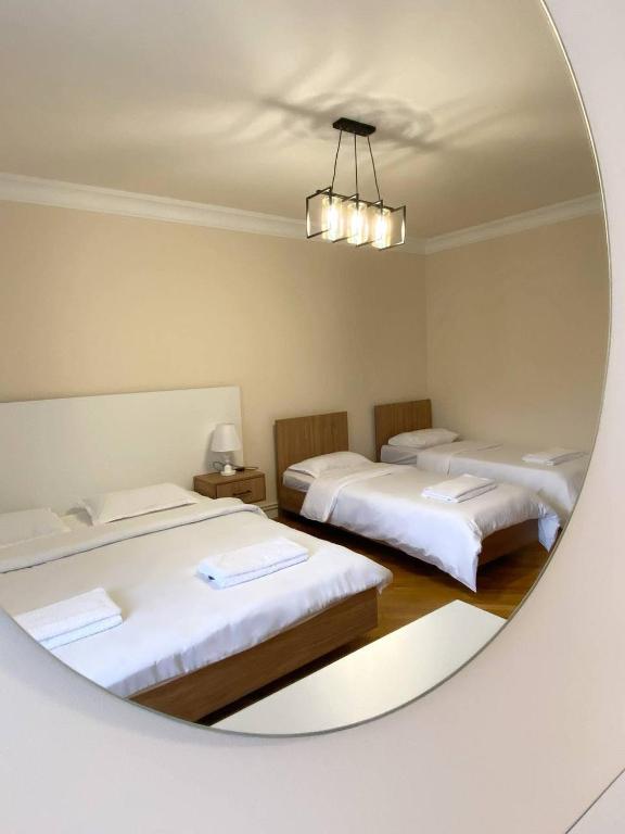 Postel nebo postele na pokoji v ubytování ECO PARK RESORT