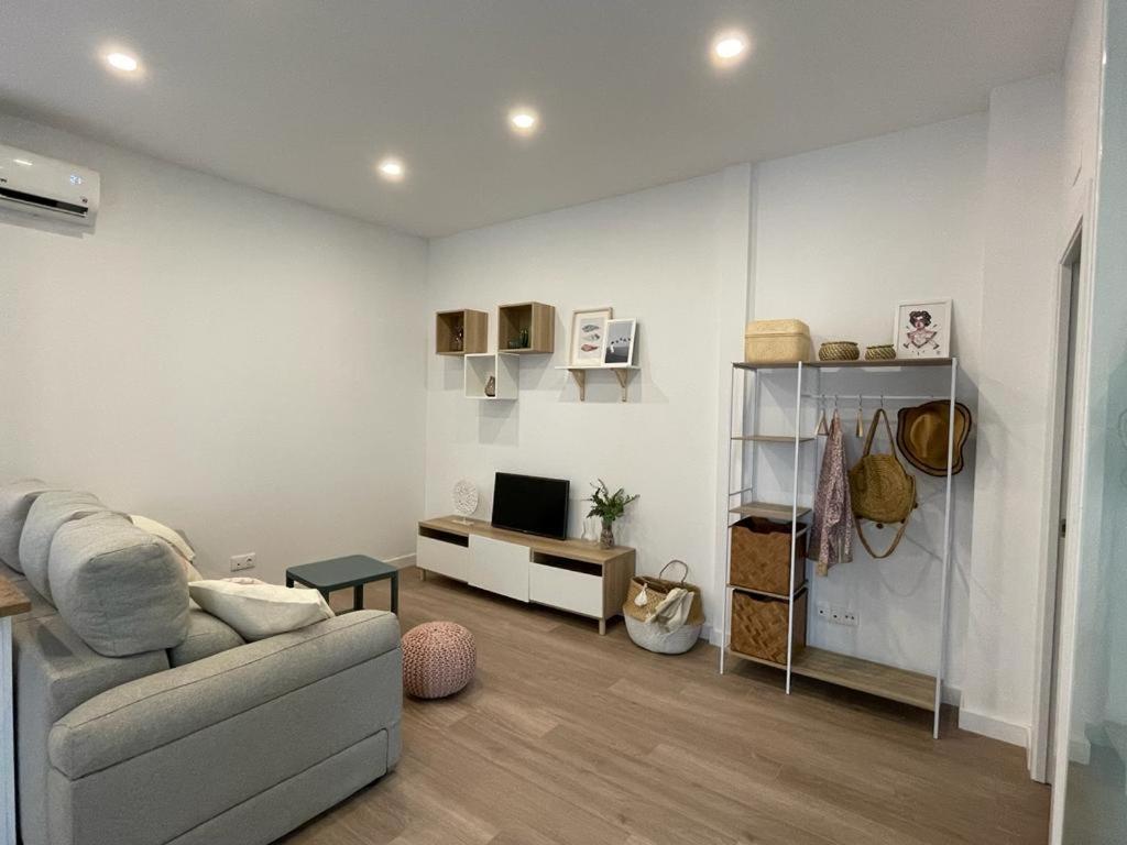 Posezení v ubytování Apartamento en casco histórico de Córdoba/piscina