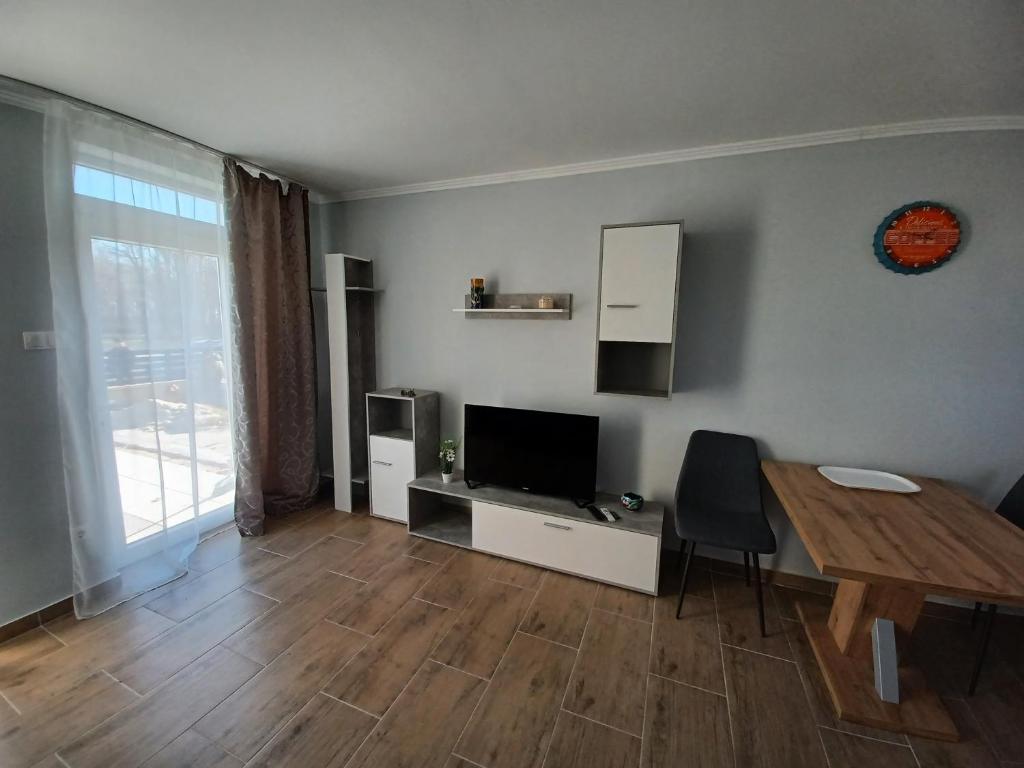TV a/nebo společenská místnost v ubytování To8 apartman