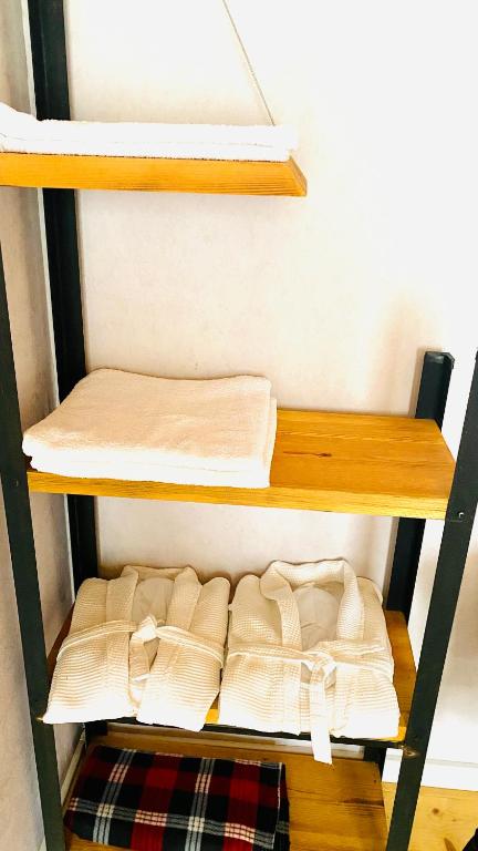 Llit o llits en una habitació de Vache Hotel