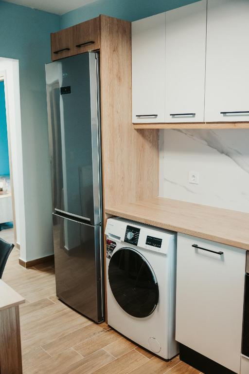 A kitchen or kitchenette at Little Villa