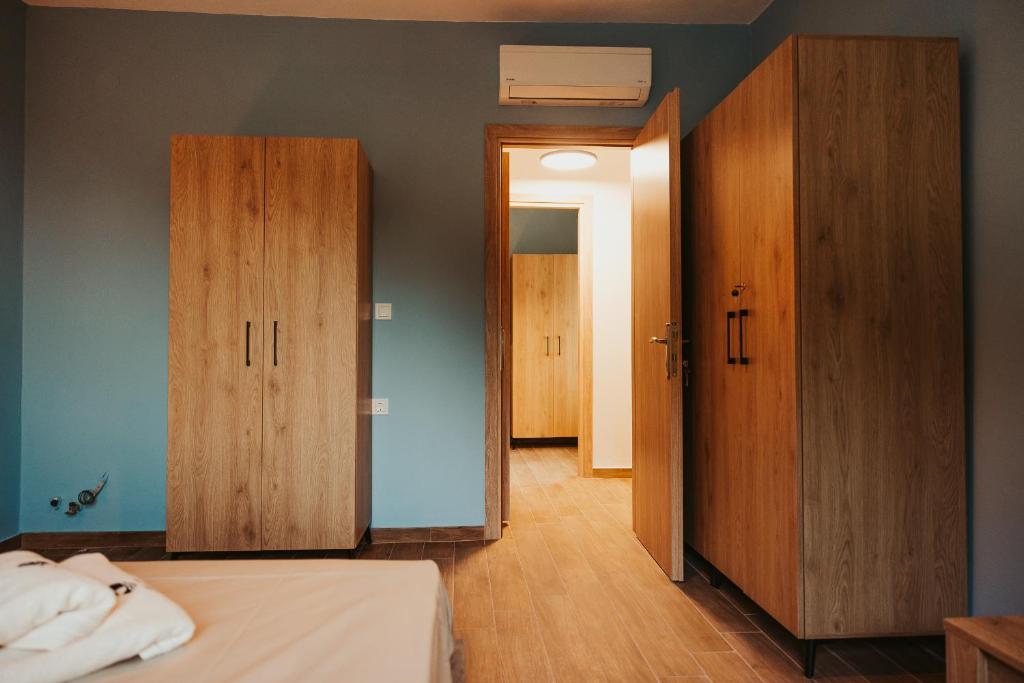 A bed or beds in a room at Little Villa
