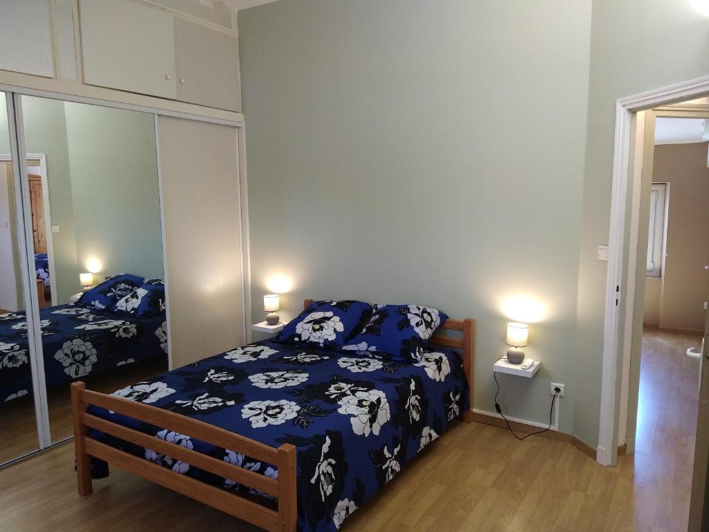Łóżko lub łóżka w pokoju w obiekcie Gîte climatisé les hirondelles