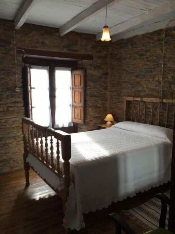 Postel nebo postele na pokoji v ubytování Casa rural **** El Barreiro. Ideal para familias.