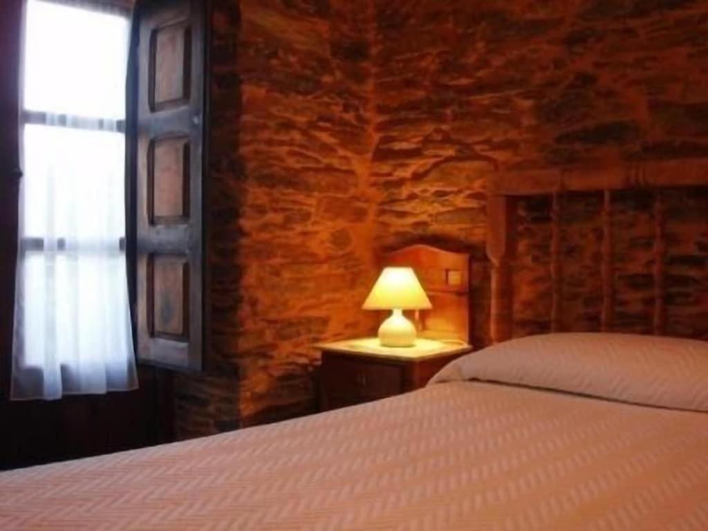 Postel nebo postele na pokoji v ubytování Casa rural **** El Barreiro. Ideal para familias.