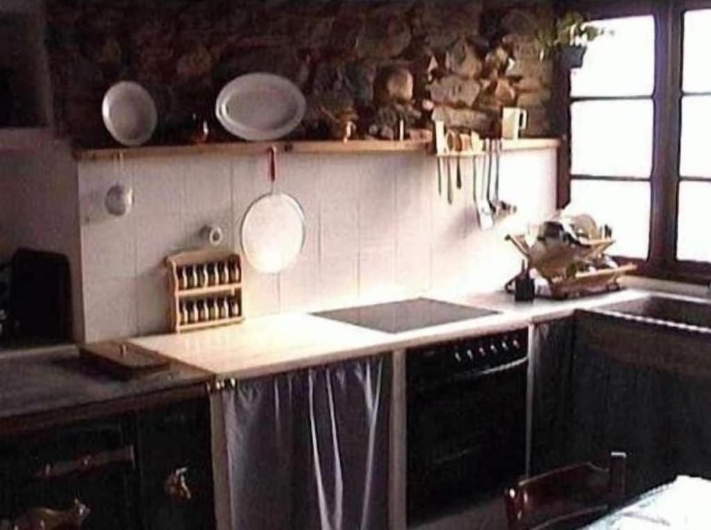 Kuchyň nebo kuchyňský kout v ubytování Casa rural **** El Barreiro. Ideal para familias.