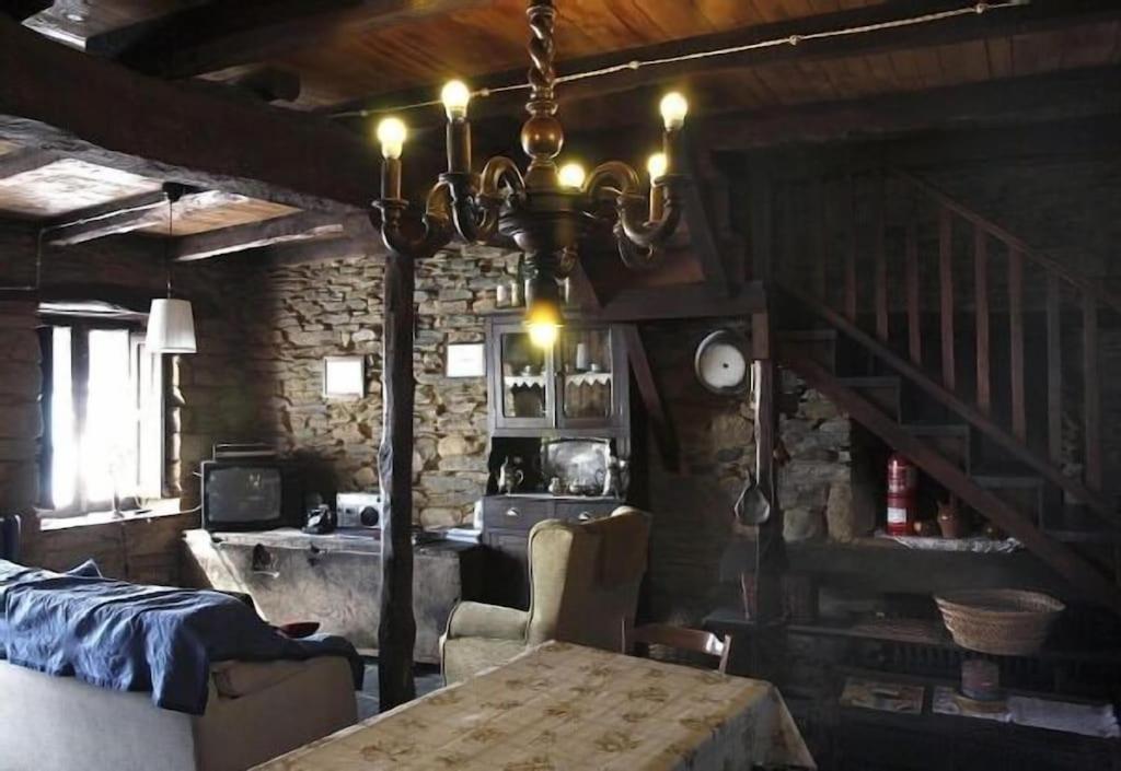 Posezení v ubytování Casa rural **** El Barreiro. Ideal para familias.