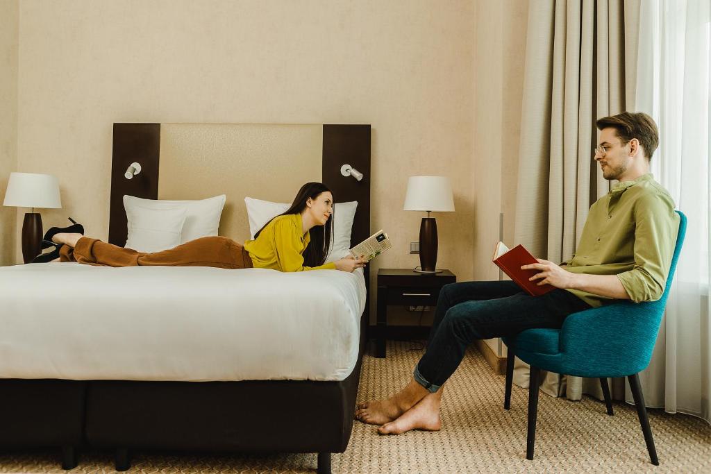 Posteľ alebo postele v izbe v ubytovaní Hotel Polonia Palace
