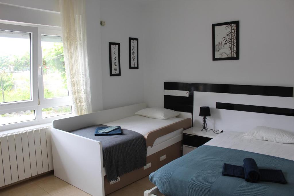 Postel nebo postele na pokoji v ubytování Casa Frutales Escaselas