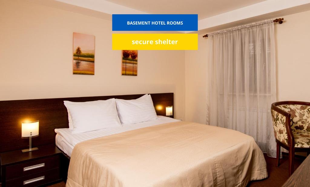 Кровать или кровати в номере Инкогнито Бутик-Отель
