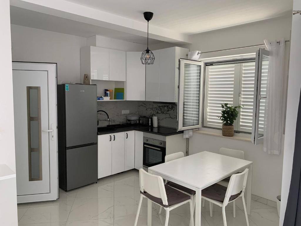Kuchyň nebo kuchyňský kout v ubytování Hygge Apartments