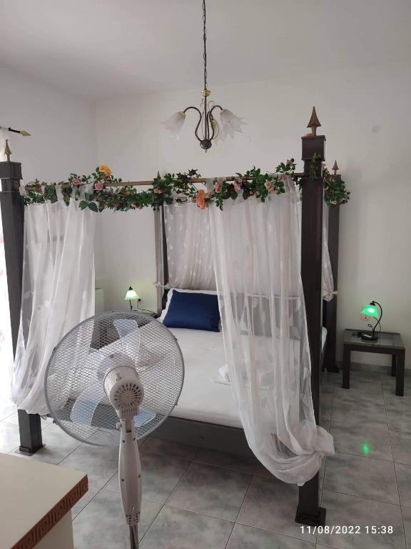 Postel nebo postele na pokoji v ubytování Myrtia Guest House