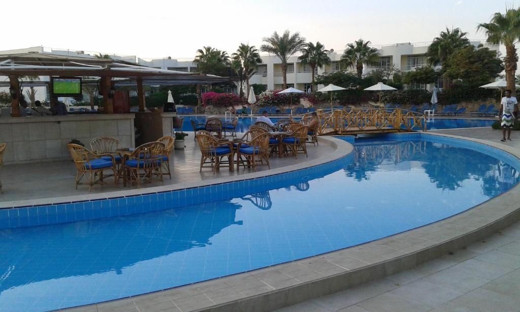 Bazén v ubytování Sharm Reef Hotel nebo v jeho okolí