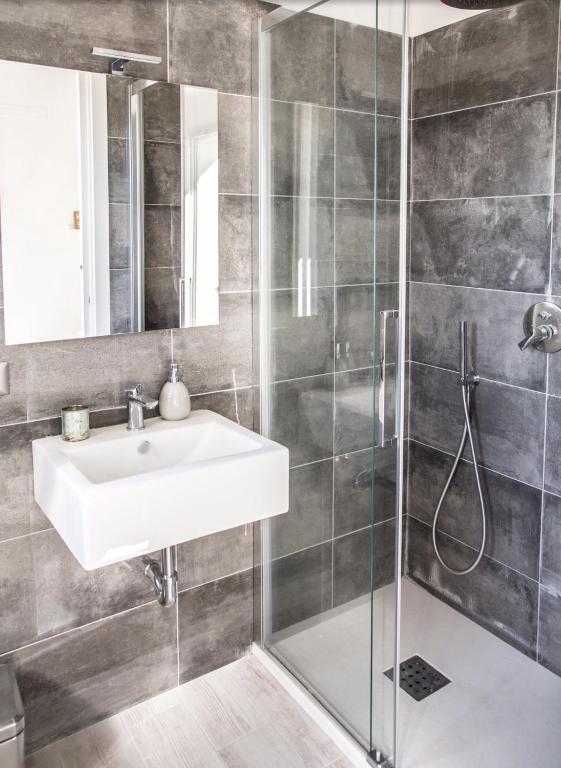 Een badkamer bij Oliveto Bed and Breakfast
