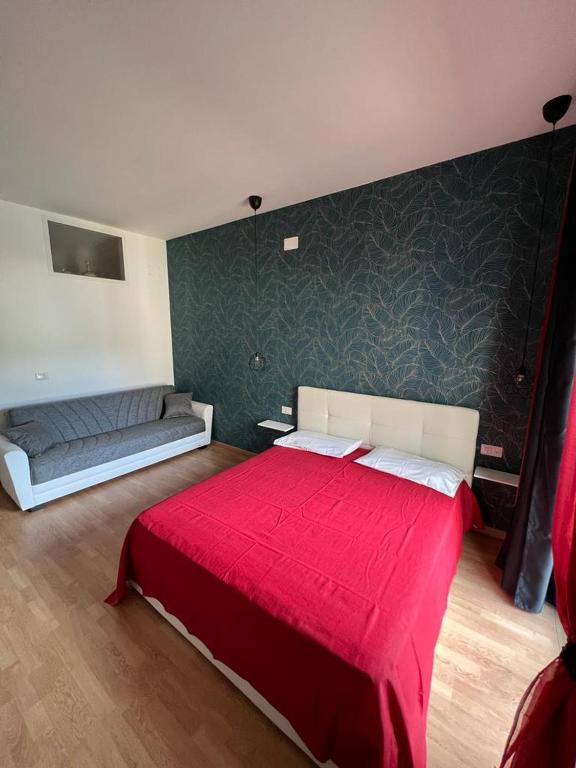 A bed or beds in a room at Casa di Charlie