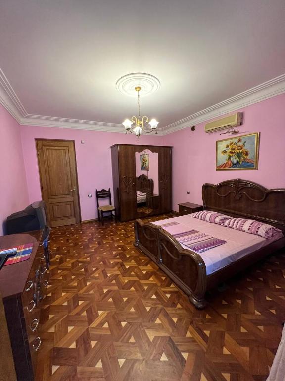 Postel nebo postele na pokoji v ubytování Guesthouse Parnavaz Mepe