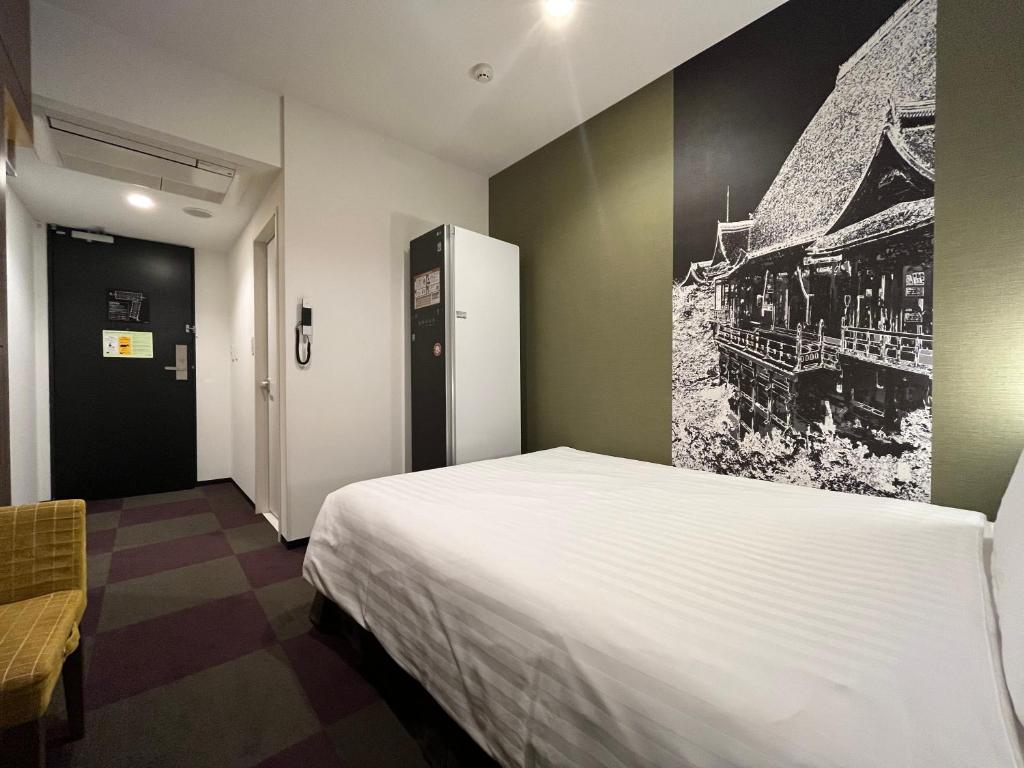 Voodi või voodid majutusasutuse Henn na Hotel Tokyo Haneda toas