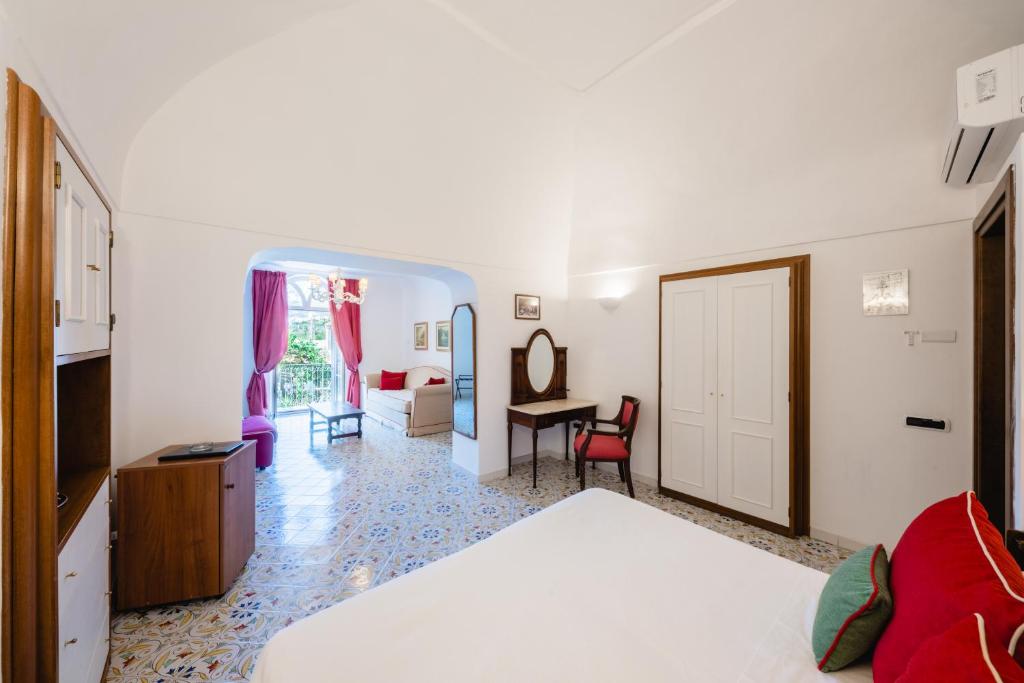 Postel nebo postele na pokoji v ubytování Hotel Giordano