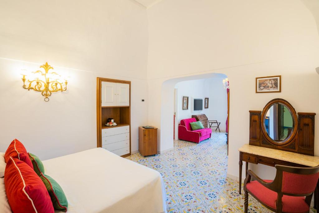 Postel nebo postele na pokoji v ubytování Hotel Giordano