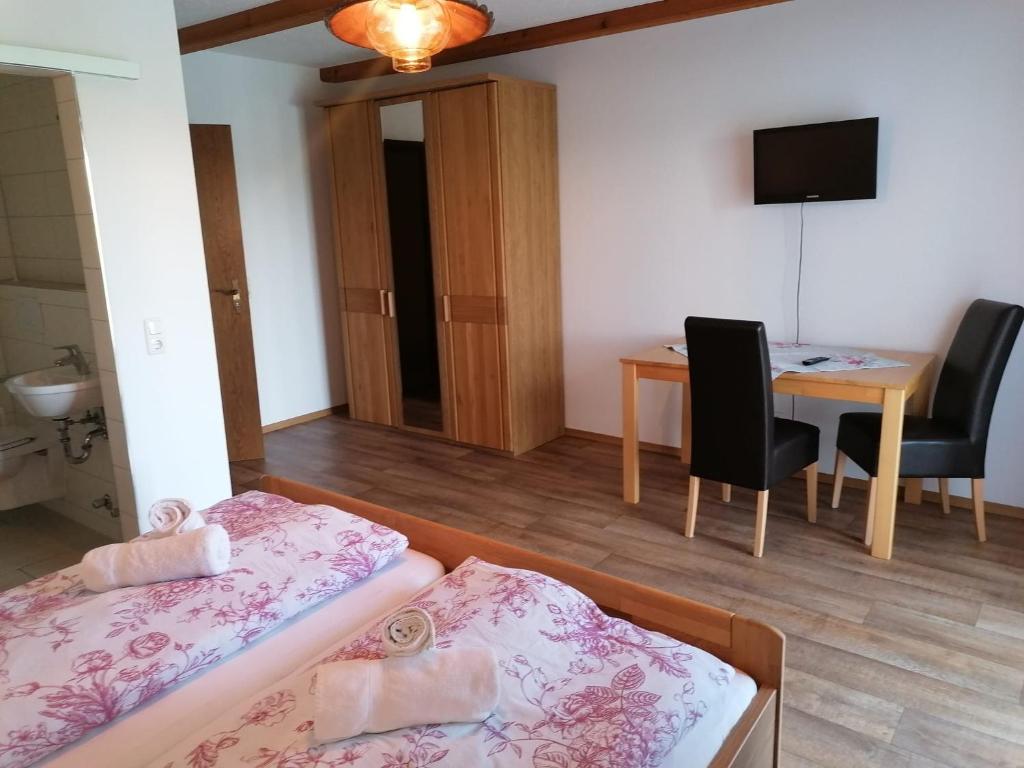 Postel nebo postele na pokoji v ubytování Pension Ambros