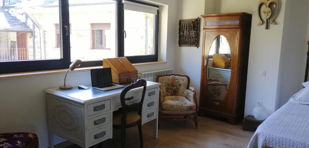 Postel nebo postele na pokoji v ubytování CURATO EL HORNO