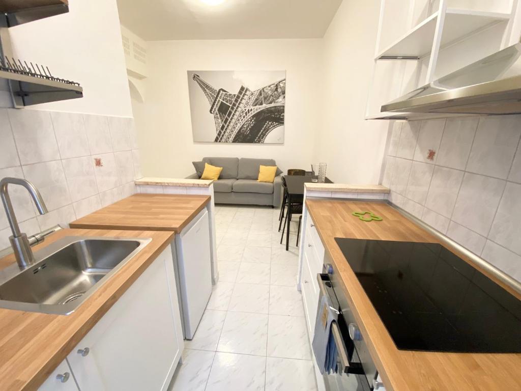Kuchyň nebo kuchyňský kout v ubytování Art Atelier Apartments