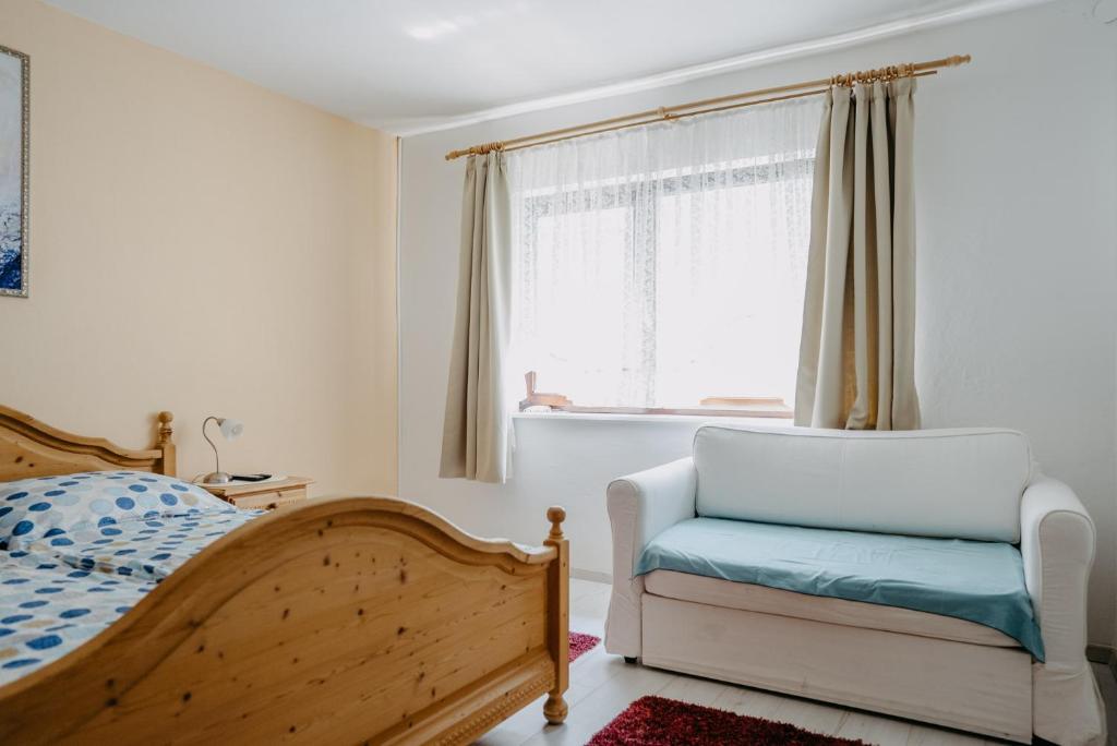 Postel nebo postele na pokoji v ubytování Ferienhaus RADO