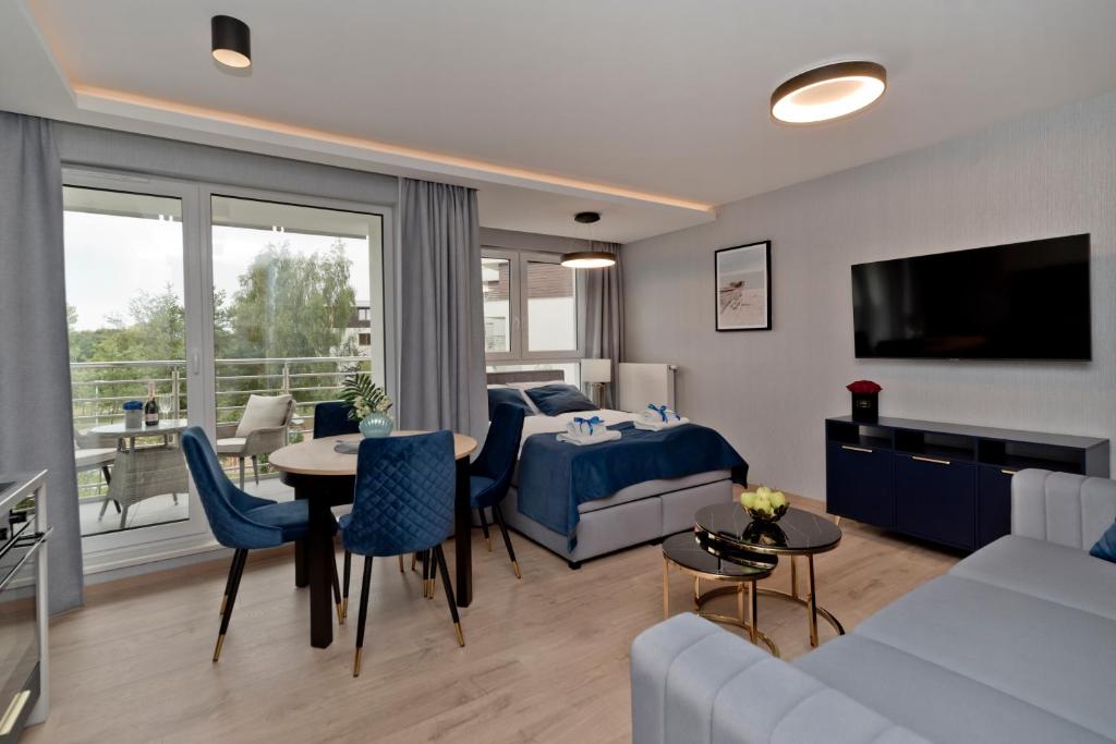 TV a/nebo společenská místnost v ubytování BlueApart Apartamenty Na Klifie