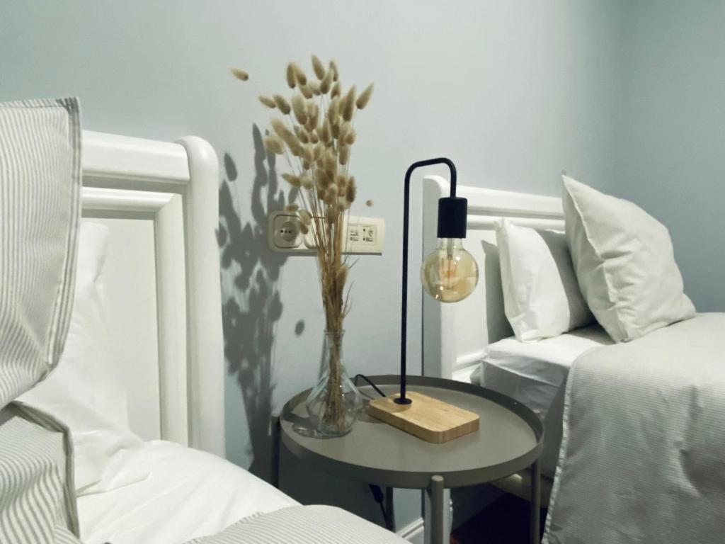 A bed or beds in a room at Piso Céntrico 120m2 + parking propio (O Grove)
