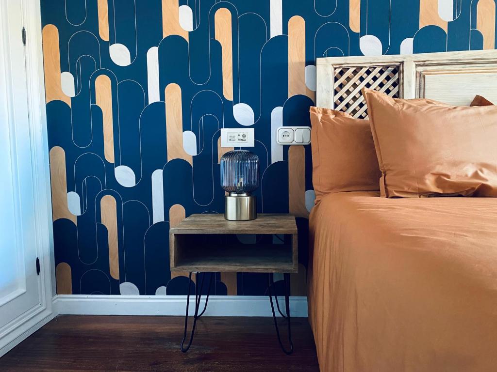 A bed or beds in a room at Piso Céntrico 120m2 + parking propio (O Grove)
