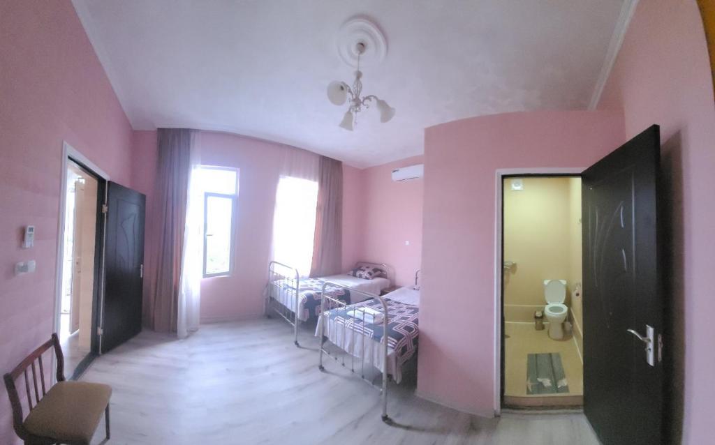 Postel nebo postele na pokoji v ubytování Guest House Sveta