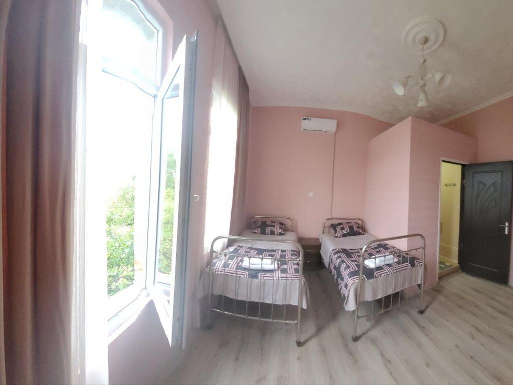 Postel nebo postele na pokoji v ubytování Guest House Sveta