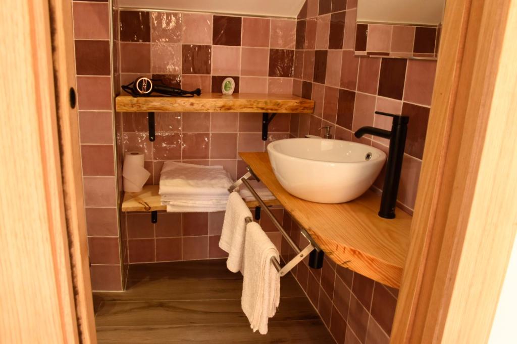 Koupelna v ubytování Apartamentos Tierra y Arte