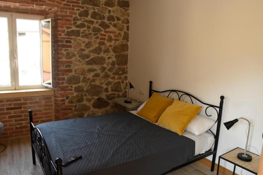 Postel nebo postele na pokoji v ubytování Apartamentos Tierra y Arte