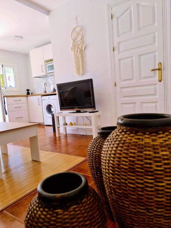 TV a/nebo společenská místnost v ubytování VILLA PITATO Nuevo, cerca de la Playa, Parking en la puerta del alojamiento