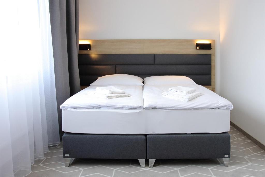 Posteľ alebo postele v izbe v ubytovaní Typton hotel&spa