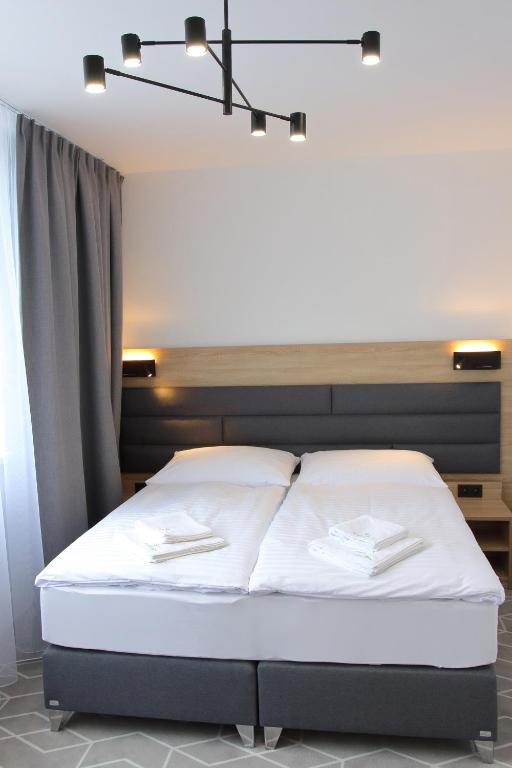 Posteľ alebo postele v izbe v ubytovaní Typton hotel&spa