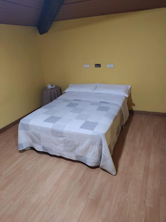 Postel nebo postele na pokoji v ubytování Hostal Rural Oricáin