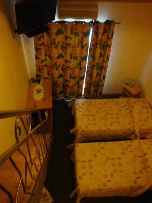 Postel nebo postele na pokoji v ubytování Le Bilboquet