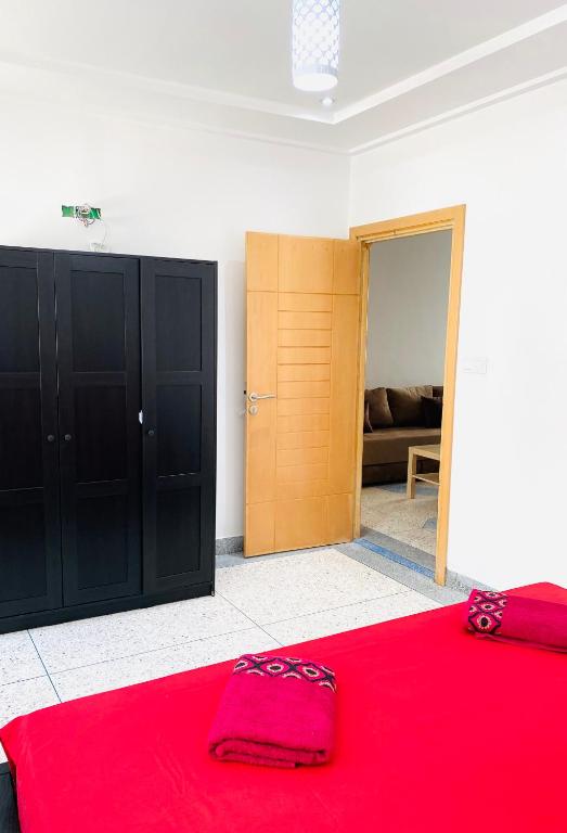 Postel nebo postele na pokoji v ubytování Résidence Bario H