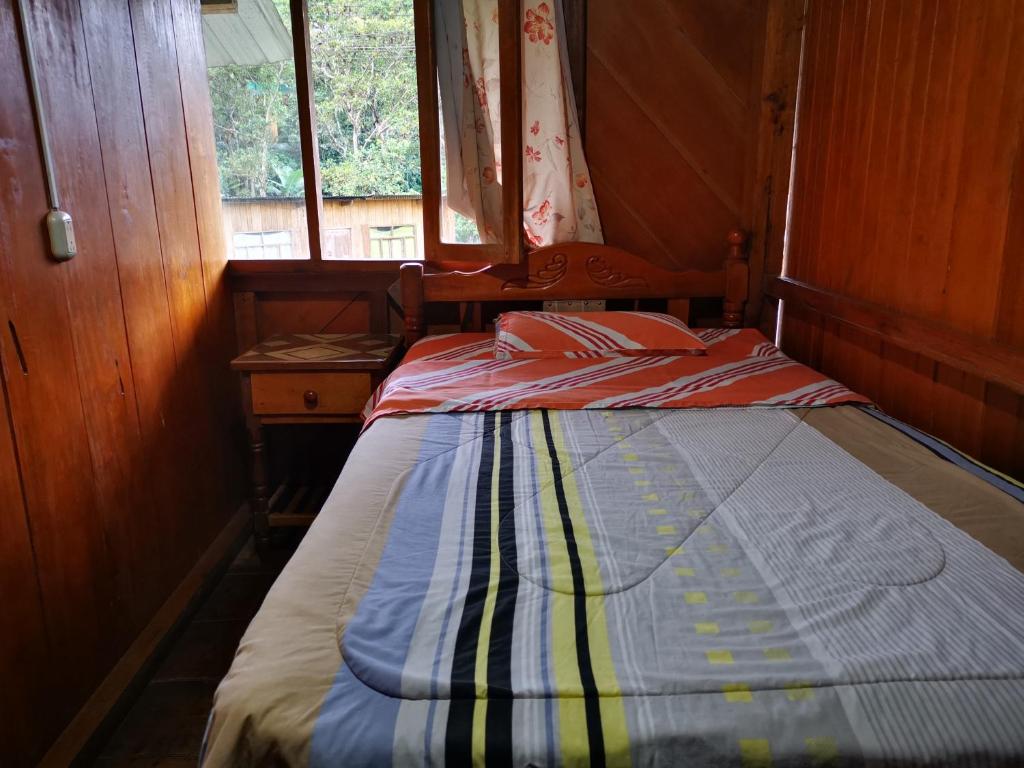 Postel nebo postele na pokoji v ubytování LA TRANQUILIDAD
