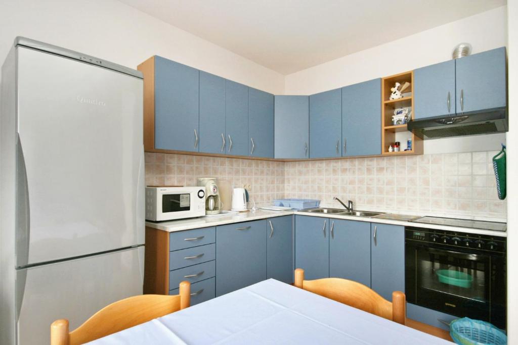 Kuchyň nebo kuchyňský kout v ubytování Apartments with a parking space Crikvenica - 5493