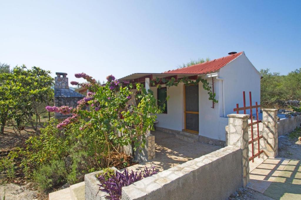Secluded house with a parking space Cove Tudorovica, Korcula - 11426