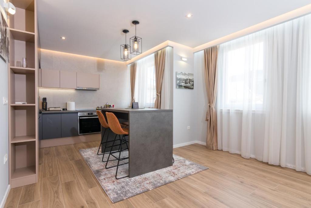 Kuchyň nebo kuchyňský kout v ubytování Mayisa Apartments
