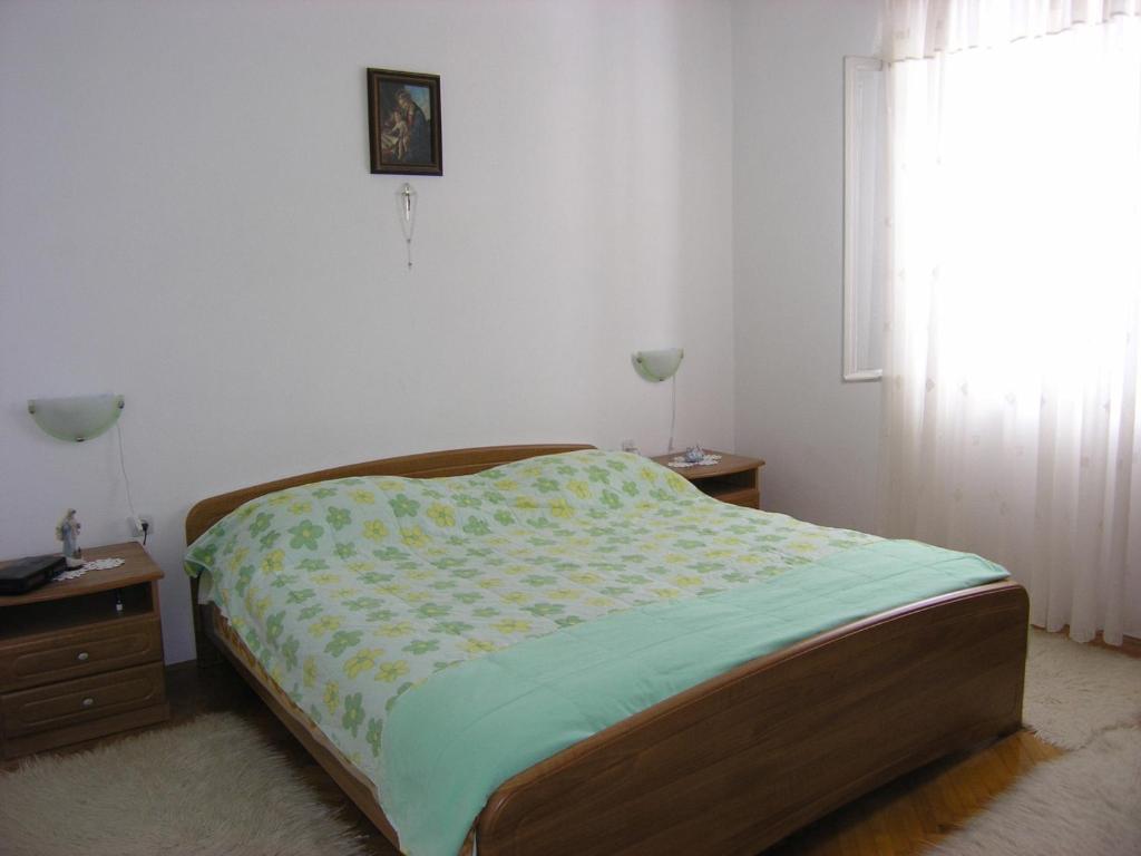 Postel nebo postele na pokoji v ubytování Apartments with WiFi Postira, Brac - 11494
