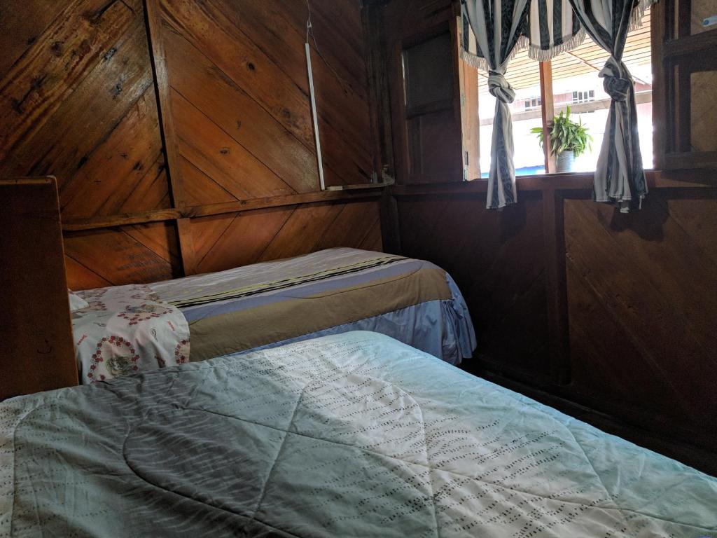 Postel nebo postele na pokoji v ubytování LA TRANQUILIDAD